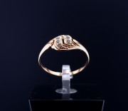 Gold ring with zircons