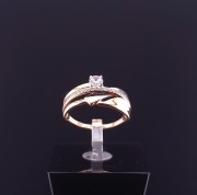 Gold ring with zircons