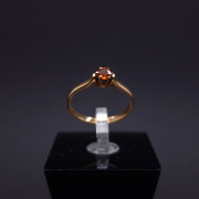 Gold ring with orange topaz