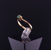 Gold ring with colored stone