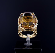 Gold ring with colored stones