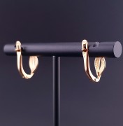 Gold earrings with zircons 