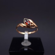 Gold ring with colored stone