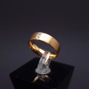 Gold wedding ring with diamonds