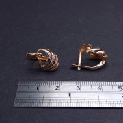 Gold earrings with zircons