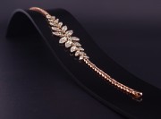 Gold bracelet with zircons