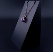 Gold pendant with colored stones
