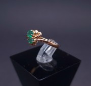 Gold ring with colored stones