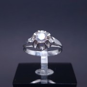 White gold ring with zircons