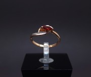 Gold ring with colored stone