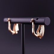 Gold earrings with zircons 