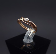 Gold ring with zircons