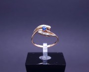 Gold ring with diamonds and colored stone