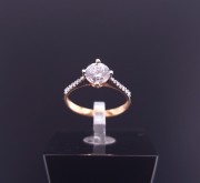 Gold ring with zircons