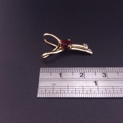 Gold pendant with colored stones