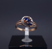 Gold ring with diamonds and sapphires