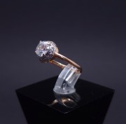 Gold ring with zircons