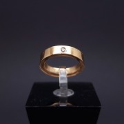 Gold wedding ring with diamond