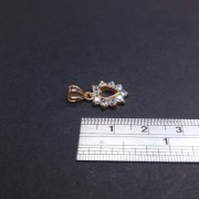 Gold pendant with zircons