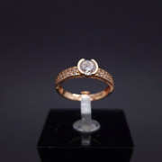 Gold ring with zircons