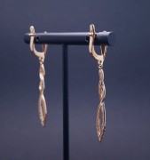 Gold earrings with zircons 