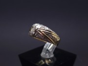 Gold ring with zircons