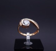 Gold ring with zircons