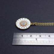 Gold chain and pendant with diamonds