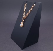 Gold pendant with pearls and zircon