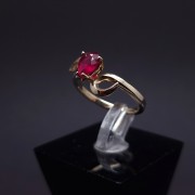 Gold ring with a garnet