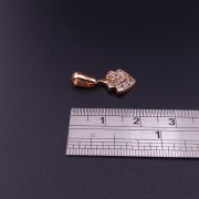 Gold pendant with zircons