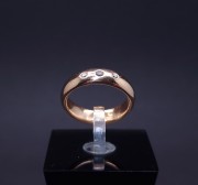 Gold wedding ring with diamonds