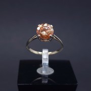 Gold ring with colored stone