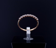 Gold ring with zircons