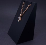 Gold pendant with zircon