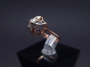 Gold ring with zircons