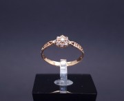 Gold ring with zircons