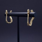 Gold earrings with zircons 