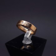 Gold wedding ring with diamond