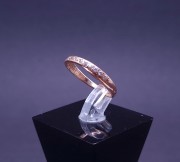 Gold ring with zircons