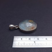 Silver pendant with colored stone