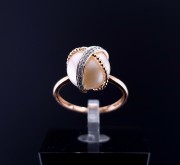 Gold ring with diamonds and pearls