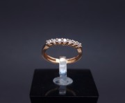 Gold ring with zircons