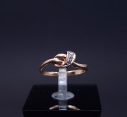 Gold ring with zircons