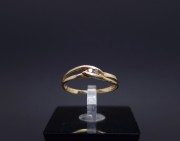 Gold ring with zircons