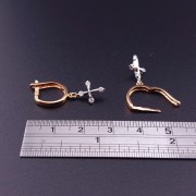 Gold earrings with zircons 