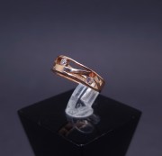 Gold ring with zircons