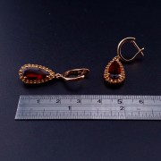 Золотые серьги с цветными камнями
