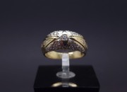 Gold ring with zircons