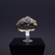 Gold ring with zircons